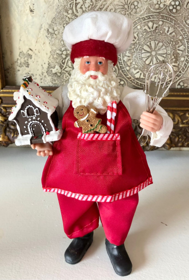 Kerstman met bruin peperkoekhuisje