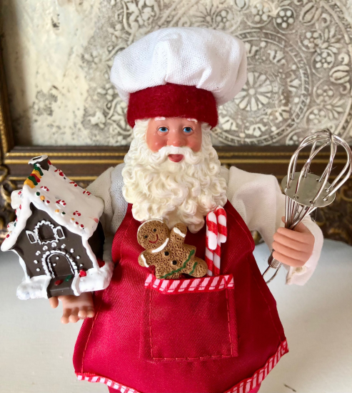 Kerstman met bruin peperkoekhuisje