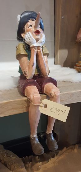 Pinokio Zittend Groot